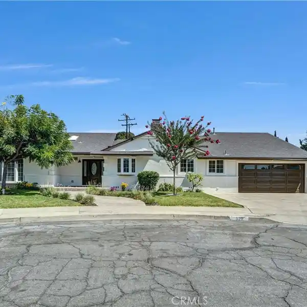 REMODELED HOME WITH POOL ON AN EXPANSIVE LOT