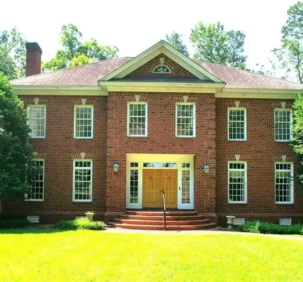 LAKEFRONT ELEGANCE ON TWO-PLUS ACRES