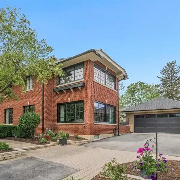 STATELY BRICK PRAIRIE HOME STEPS FROM RIVERWALK