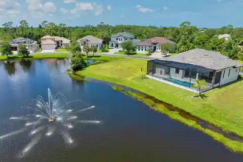 Sophisticated Waterfront Living with Designer Touches and Pool