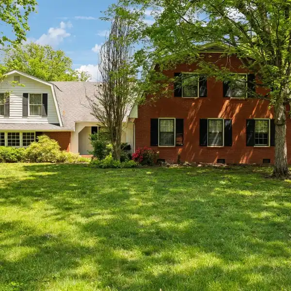 INVITING HOME ON A LARGE LEVEL LOT