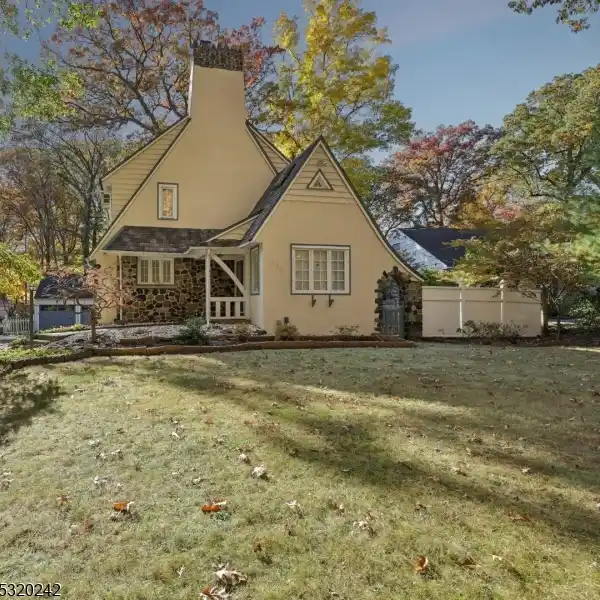 LOVELY TUDOR HOME IN A FOREST SETTING