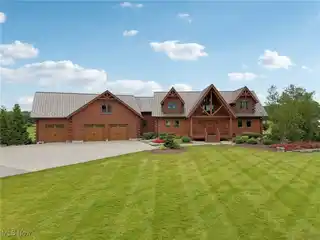 Breathtaking Log Home in a Serene Country Setting