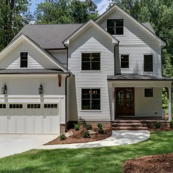 NEW CUSTOM CONSTRUCTION ON A SPRAWLING WOODED LOT