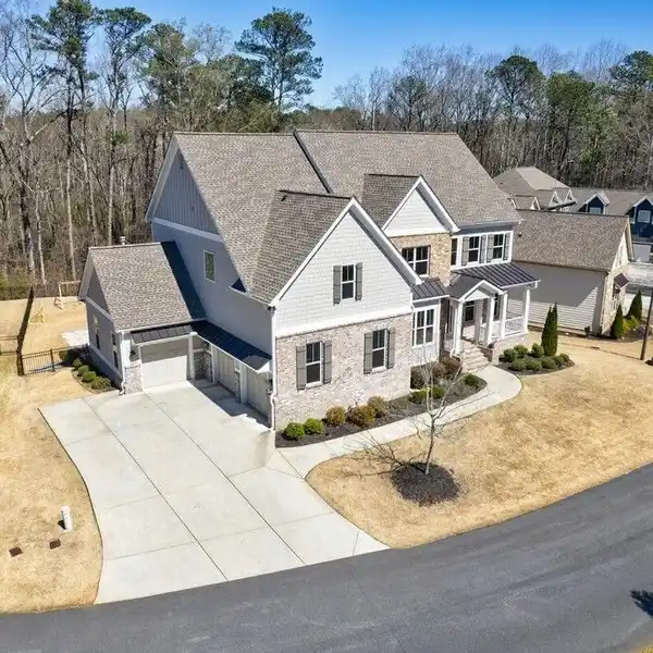 METICULOUSLY MAINTAINED HOME ON A LANDSCAPED ACRE