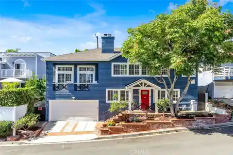 Coastal Elegance with Designer Upgrades and Entertainer’s Backyard