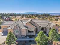 LOVELY CUSTOM RANCH WITH SWEEPING MOUNTAIN VIEWS