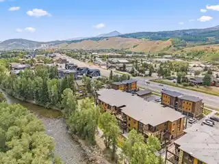 Premier Top-Floor Riverfront Property