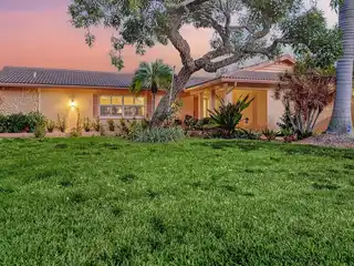 Classic Canal-Front Masonry Beach Home