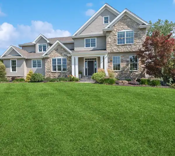 CUSTOM SAND CREEK RETREAT WITH DESIGNER FINISHES