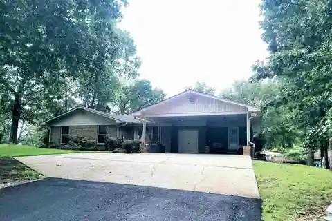Tranquil Lakefront Gem with Endless Potential