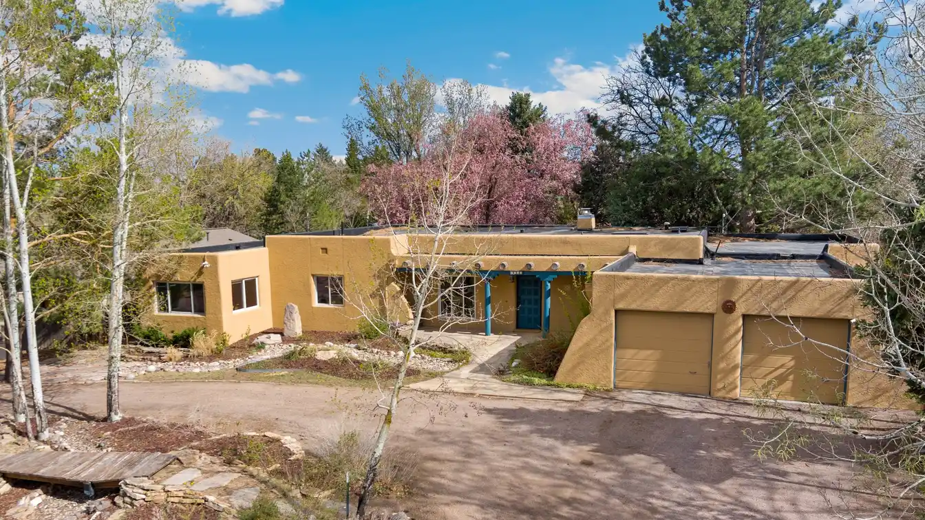 Classic Pueblo Revival Charm Meets Modern Comfort!