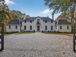 Exceptional Gated Luxury with Heated Pool and Timeless Design