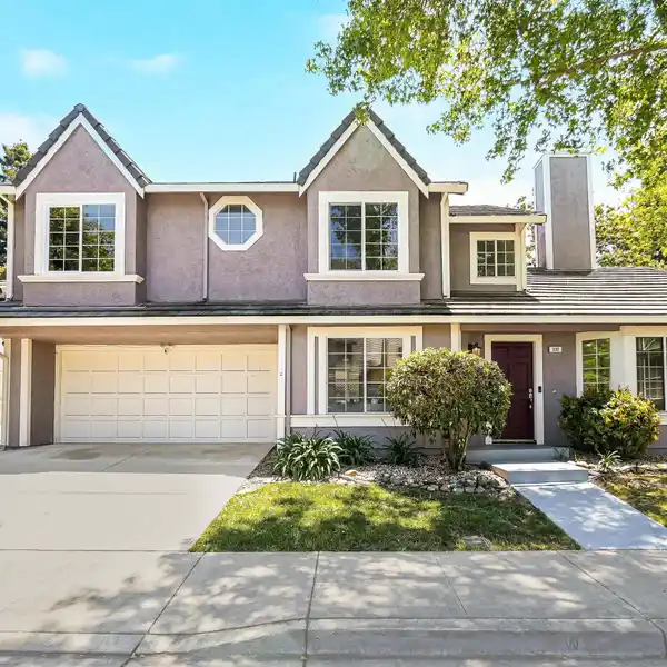 BEAUTIFULLY MAINTAINED HOME WITH MODERN UPGRADES