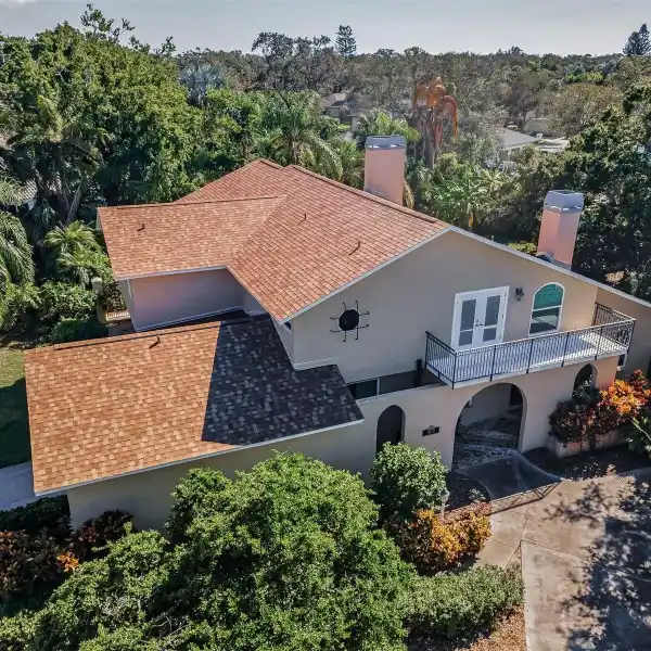 GRAND MEDITERRANEAN HOME WITH COVERED LANAI AND ARCHES