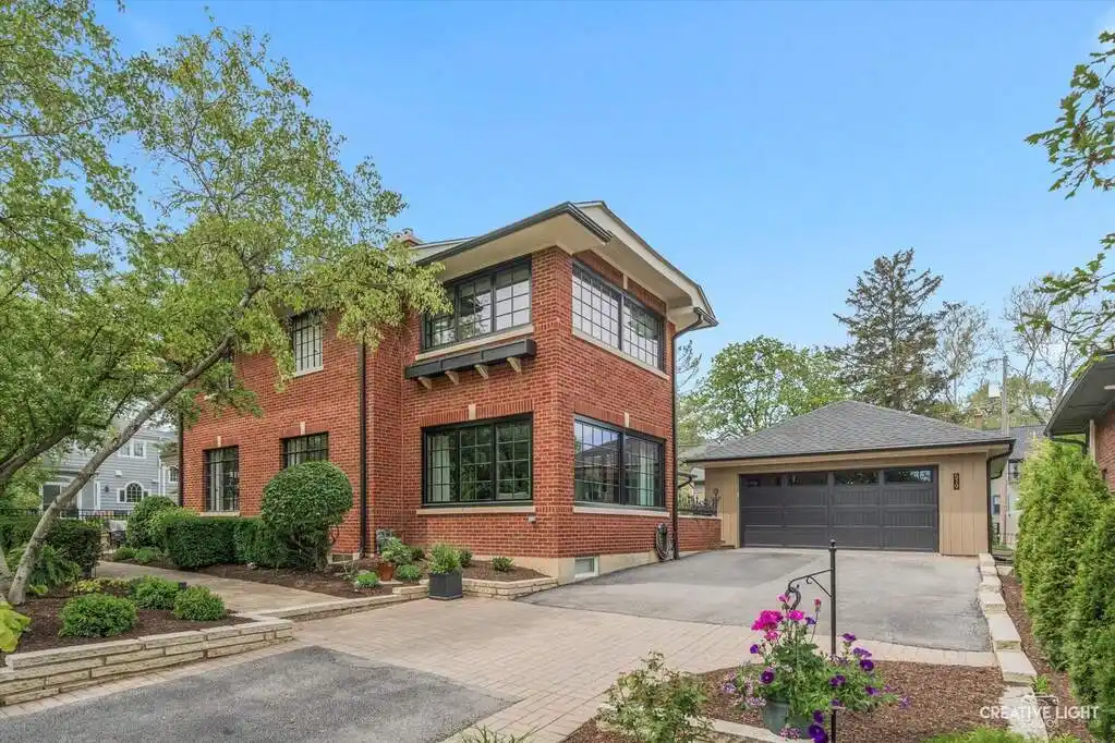 Stately Brick Prairie Home Steps from Riverwalk