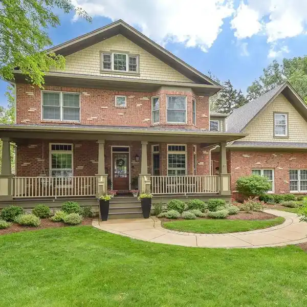 EXQUISITE BRICK AND CEDAR HOME ON A DOUBLE LOT