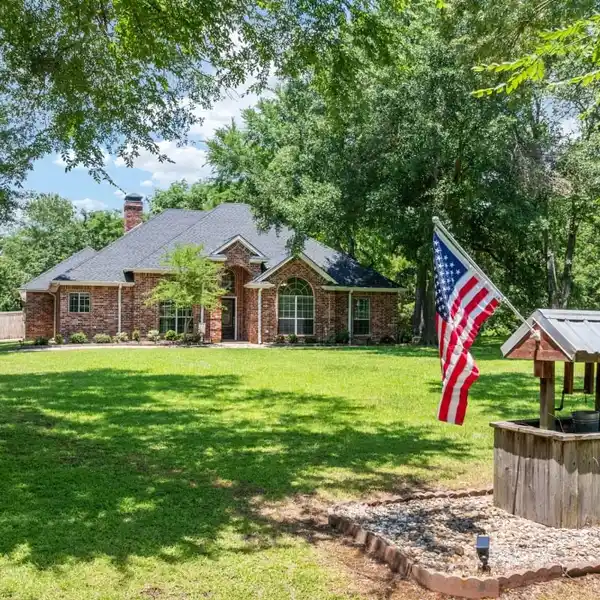 RARE WATERFRONT ACREAGE WITH OPEN LAYOUT HOME