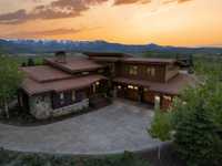 WARM MOUNTAIN CONTEMPORARY HOME WITH SWEEPING VIEWS OF THE WASATCH BACK