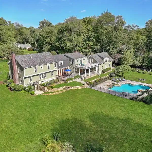EXPANDED COLONIAL ESTATE HOME IN GREENFIELD HILL