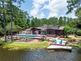 Architectural Lakefront Masterpiece with Infinity Pool