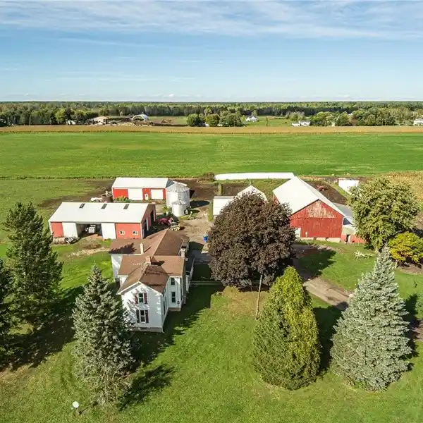 CHARMING FARMHOUSE PLUS MULTIPLE BARNS ON TEN ACRES