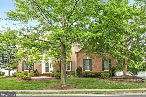 Wonderful Brick Home in Coveted Belmont Country Club Community