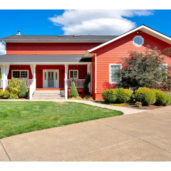 RIVERFRONT RETREAT WITH EXPANSIVE CUSTOM SHOP