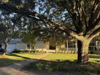Sophisticated Lakefront Living with Sunlit Interiors & Scenic Views