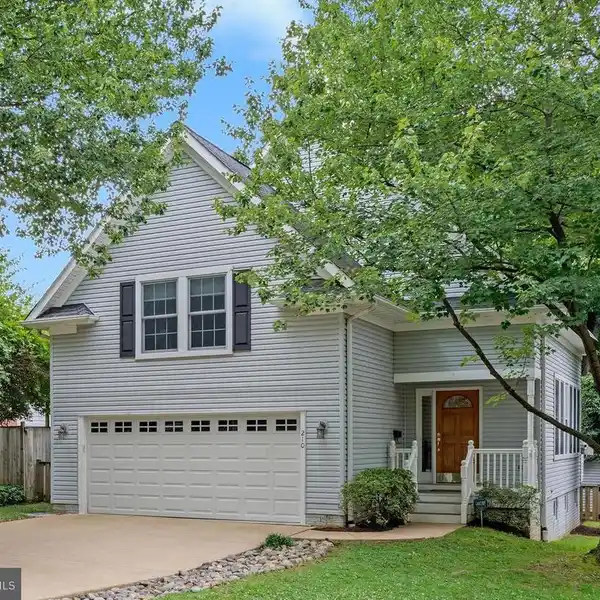 LIGHT-FILLED COLONIAL IN EXCEPTIONAL LOCATION