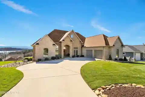Brick Ranch Home with Breathtaking Lake and Mountain Views