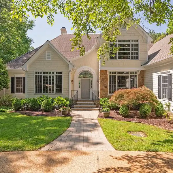 STUNNING RETREAT AWAITS AT MILL POND