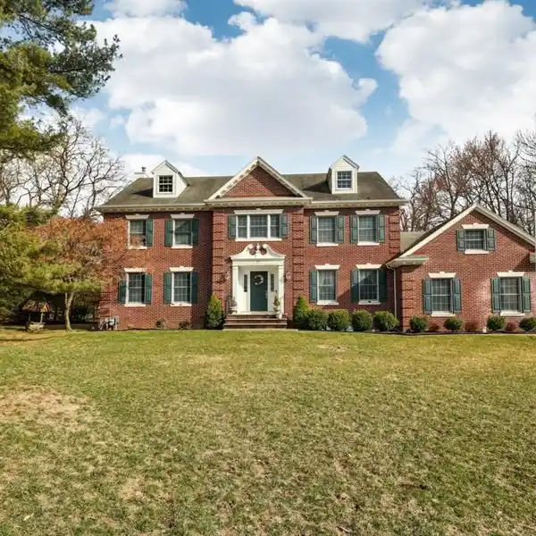 CUSTOM BRICK-FRONT CENTER HALL COLONIAL