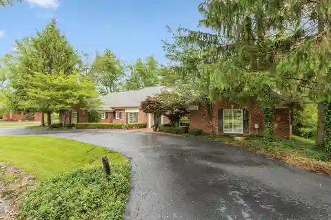 Elegant Brick Estate with Pool and Privacy