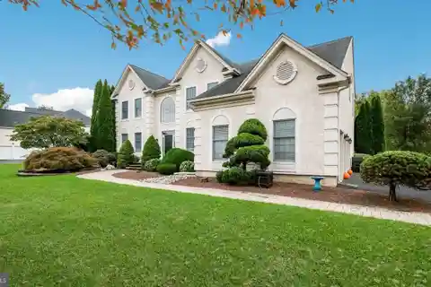 Colonial Elegance with Poolside Entertaining Oasis