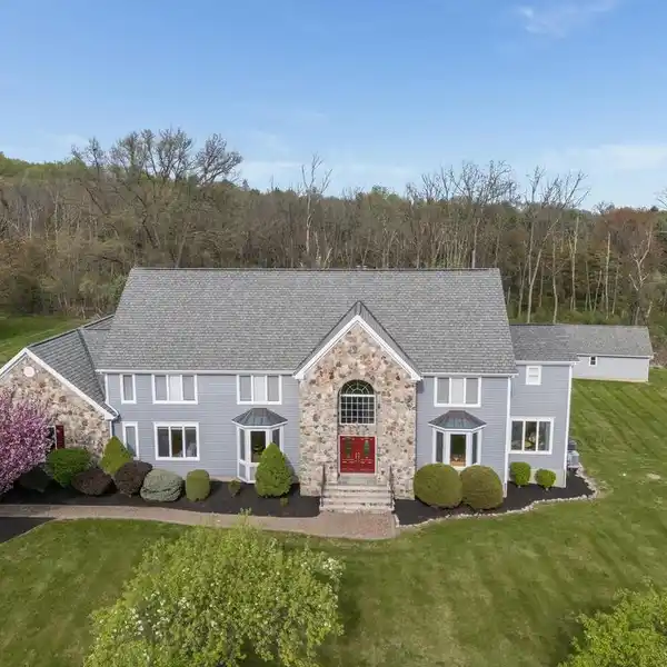 ELEGANT COLONIAL ON PRIVATE 2.33-ACRE CUL-DE-SAC