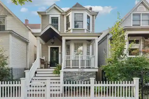 Designer Kitchen Masterpiece Anchored by Timeless Detail