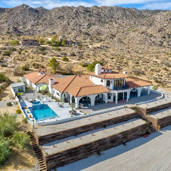 CUSTOM MEDITERRANEAN HOME ON THREE ACRES