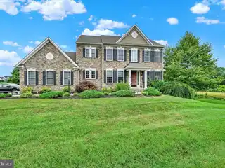 Stunning Stone Colonial with Open-Concept Living