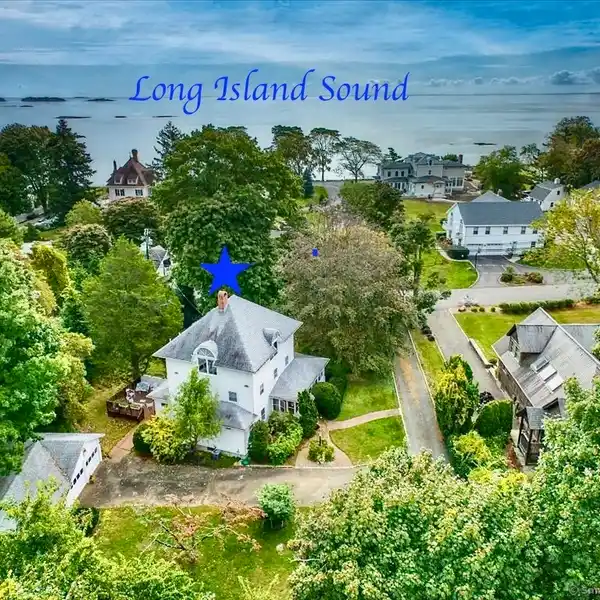 BEACHSIDE COLONIAL WITH COTTAGE CHARM