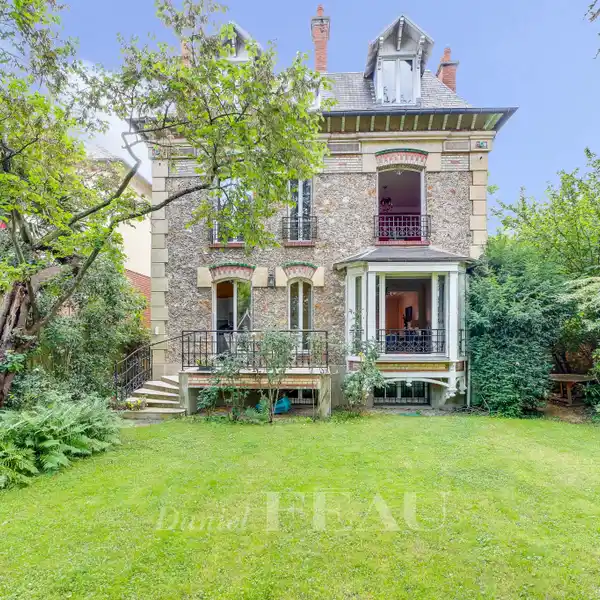 STONE HOME WITH LUSH GARDEN
