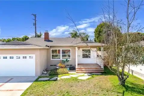 Charming Mid-Block Home with Dual Fireplaces and Modern Kitchen