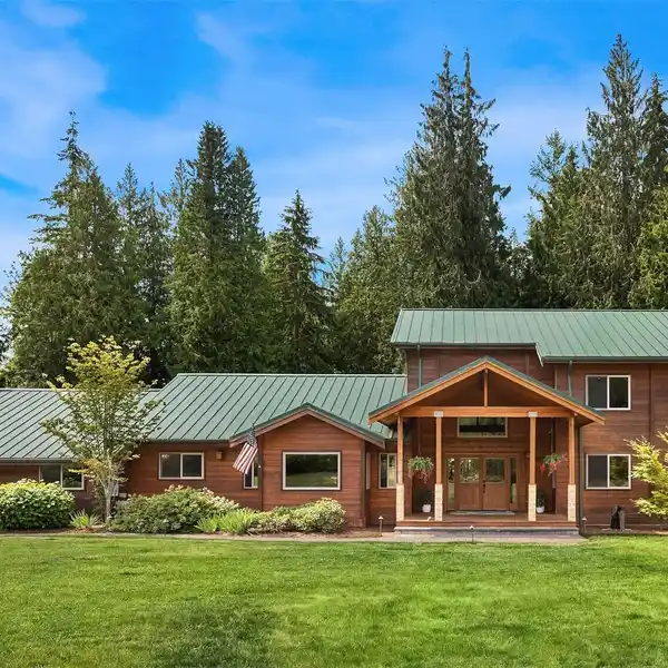 CUSTOM CEDAR HOME ON SEVEN PRIVATE ACRES