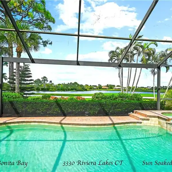 STUNNING POOL HOME WITH WATER & GOLF COURSE VIEWS
