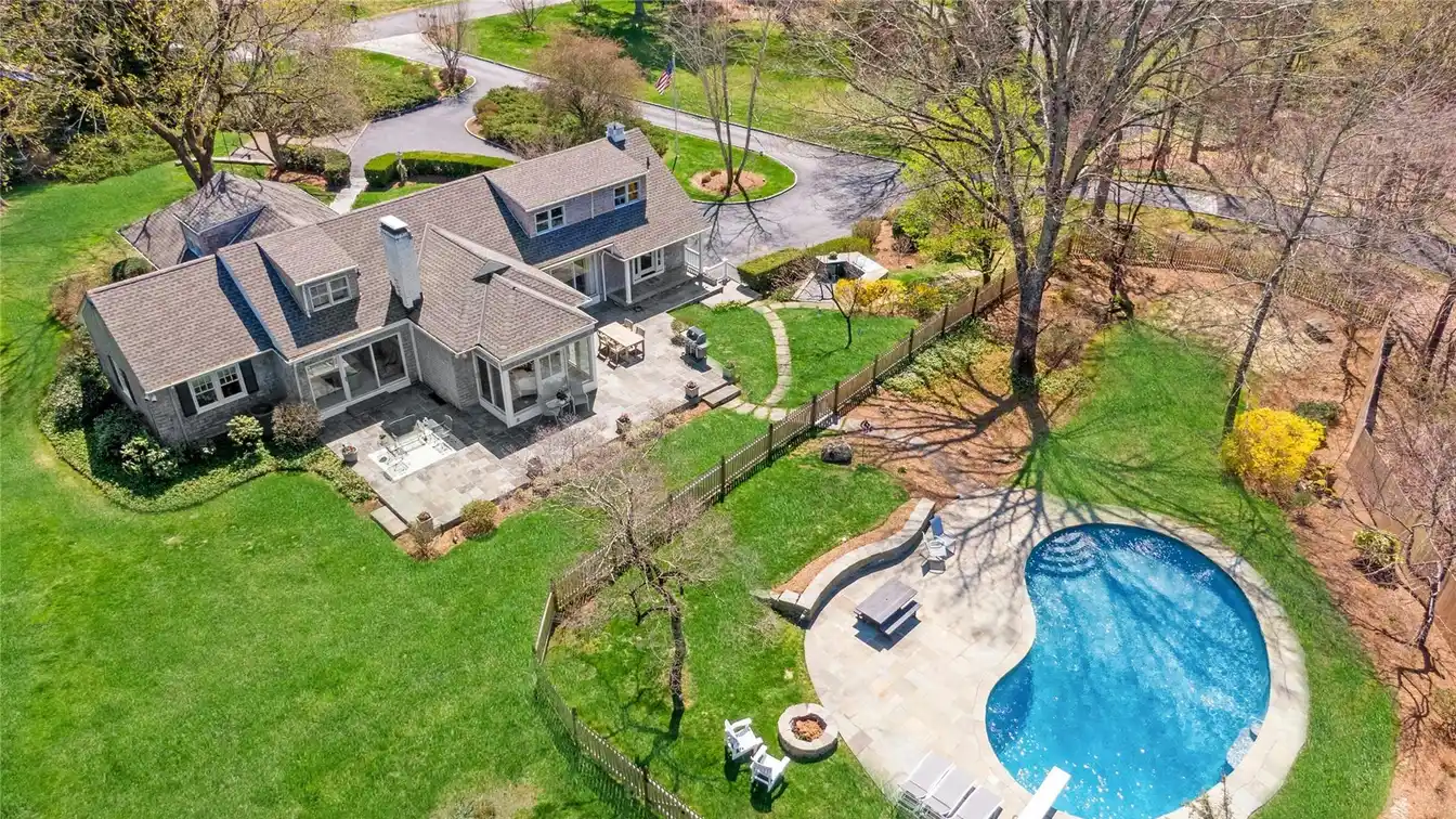 Hamptons-esque Cape Cod on Verdant Property