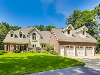 Stunning Two-Story Brick Residence Perched on a Scenic Hill