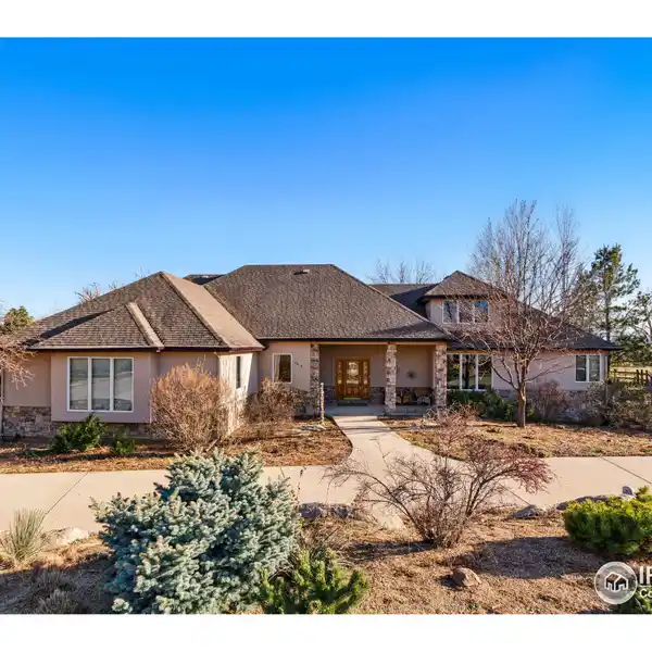 EXQUISITE HOME ON A PICTURESQUE ACRE