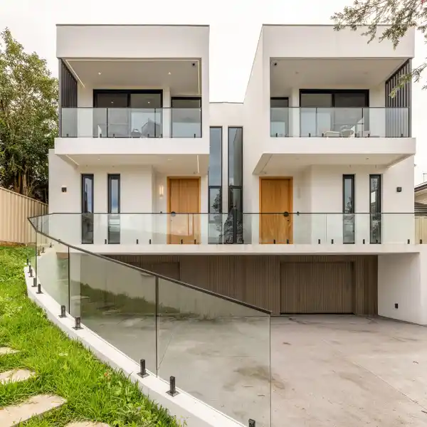 ARCHITECTURALLY CRAFTED TRI-LEVEL DUPLEX