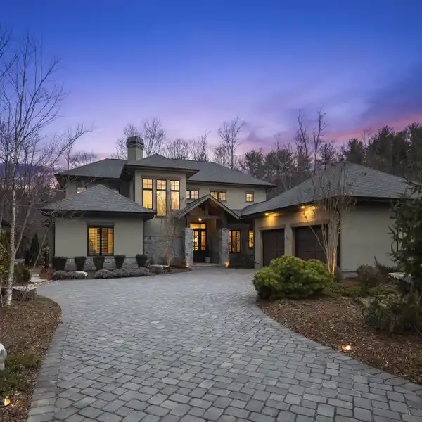 MODERN HOME IN A SERENE WOODED SETTING