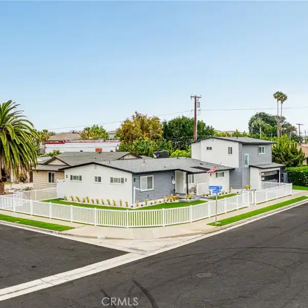 BEAUTIFUL CORNER LOT HOME WITH ENDLESS POTENTIAL